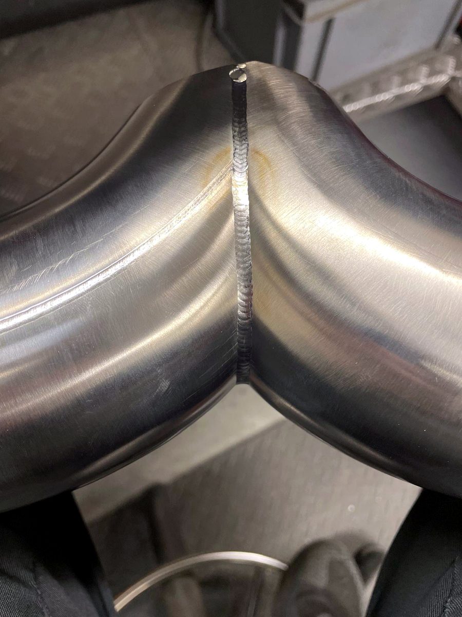 Stainless exhaust merge weld between two mandrel bends